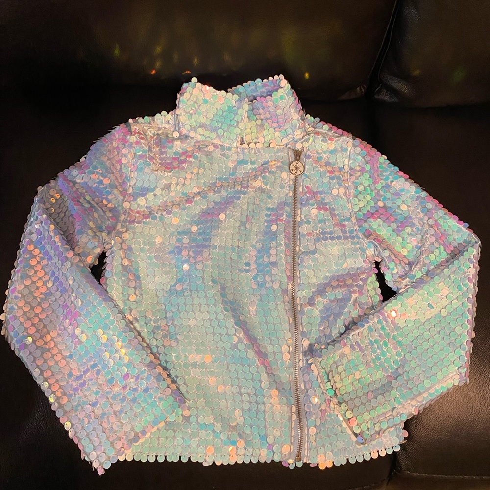 Disney’s Frozen light blue Sequin Jacket. Girls size Medium (7/8)